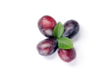 plums on white background