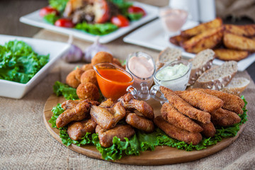 meat plate with sauces and bread for lunch