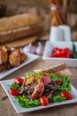meat plate with sauces and bread for lunch