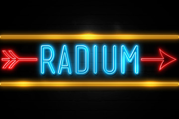 Radium  - fluorescent Neon Sign on brickwall Front view