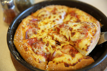 Pepperoni pizza , pizza with pepperoni mozzarella cheese and tomatoes with sauce background italian food