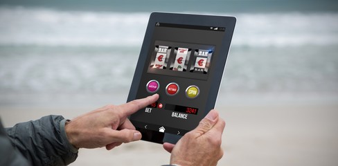 Composite image of casino slot machine game on mobile display