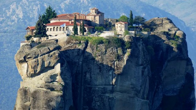 Meteora, Greece, is a natural phenomenon. Rock formations in the shape of towers reaching up to 400 meters in height. 9 of them were built Christian monasteries. It is a monument of UNESCO.