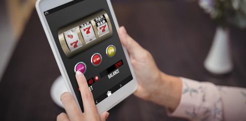 Composite image of casino slot machine game on mobile screen