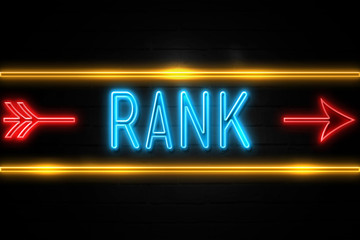 Rank  - fluorescent Neon Sign on brickwall Front view