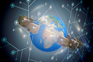 Composite image of world map amidst cardboard boxes