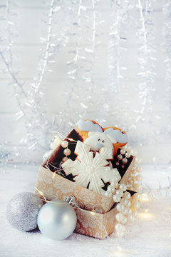 Magical winter christmas picture. Gingerbread house with snow.