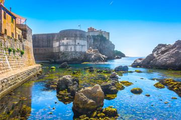 Naklejka premium Dubrovnik beach landscape view. / Seafront view at famous beach and Game of Thrones scenery in Croatia, Dubrovnik town. 