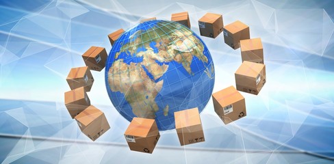 Composite image of globe amidst brown cardboard boxes