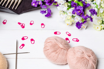 A tangle of Italian angora to knit a bright scarf for a cold day, knitting to make a meaningful present. Soft Knits from rabbit