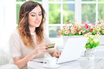 woman using   laptop