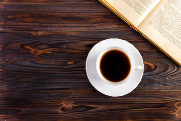 Cup of coffee on a wooden table