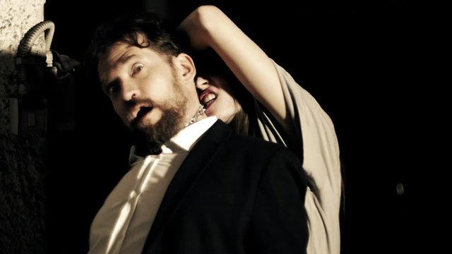 female zombie vampire killing business man slow motion