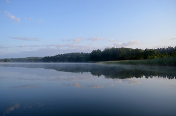Obraz na płótnie Canvas foggy morning lake summer