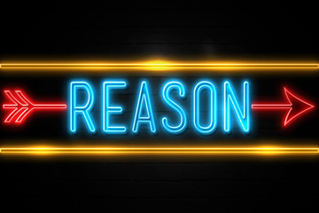 Fototapeta na wymiar Reason - fluorescent Neon Sign on brickwall Front view