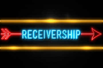 Receivership  - fluorescent Neon Sign on brickwall Front view