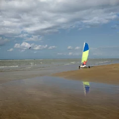 Fototapeten Land sailing on the beach of Asnelles in the Calvados department, Normandy, France. © Erik_AJV