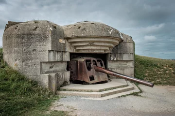 Fototapeten World War II gun battery of Longues-sur-Mer in Normandy, France. © Erik_AJV