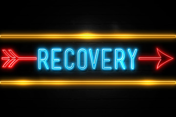 Obraz premium Recovery - fluorescent Neon Sign on brickwall Front view