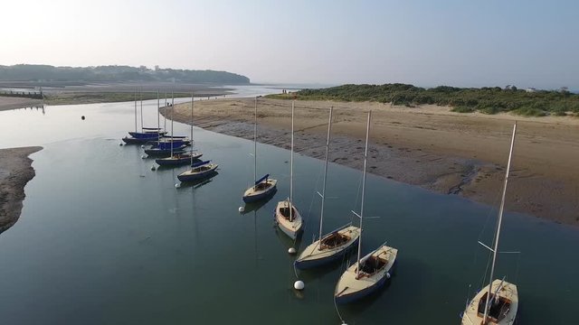 England Isle of Wight Aerial View Beach St Helens Harbour Harbour Office Brading Haven low tide in dry Harbour ebb and flow falling tide and rising tide late afternoon sun down near Ship Route