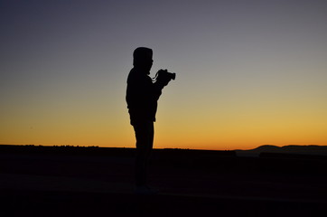 The photographer in the sunset