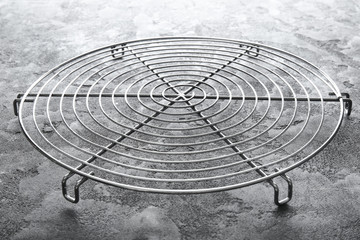 Metal cooling grid on grunge table