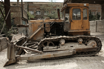 Fototapeta na wymiar Bulldozer on the territory of concrete batching plant