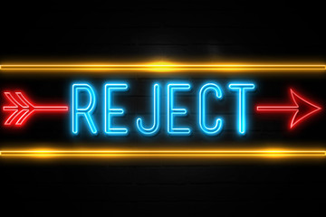 Reject  - fluorescent Neon Sign on brickwall Front view