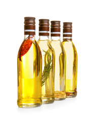 Bottles of cooking oil, isolated on white