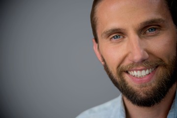Fototapeta premium Composite image of portrait of handsome man
