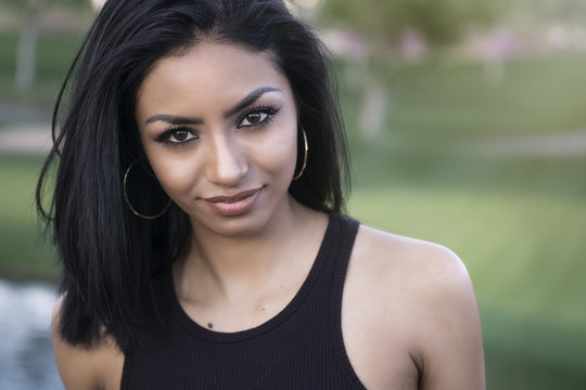 Casual outdoor photo of pretty young woman