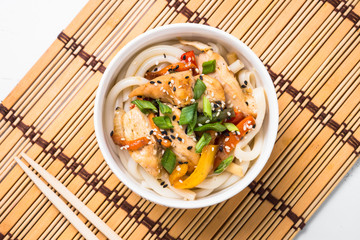 Udon stir-fry noodles with chicken.