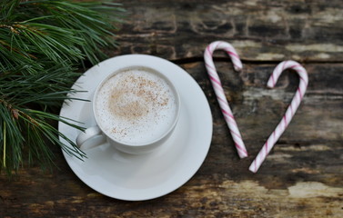 Cup of Cappuccino Beverage Wooden Background Pine Tree Concept of Christmas Top View Table Copy Space New Year Decorations 