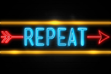 Repeat  - fluorescent Neon Sign on brickwall Front view