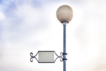 White round - ball street lamp,the inscription Board