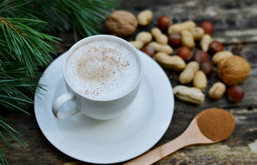 Cup of Cappuccino Beverage Wooden Background Pine Tree Concept of Christmas Top View Table Copy Space New Year Decorations 