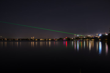 Fototapeta premium nightly panorama of Hamburg - Inner City with laser beam