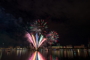 nightly panorama of Hamburg - Inner City with firework over the lake Alster