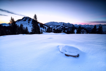 dusk in winter mountains