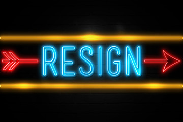 Resign  - fluorescent Neon Sign on brickwall Front view