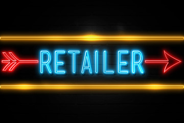 Retailer  - fluorescent Neon Sign on brickwall Front view
