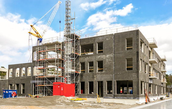School building under construction  - Powered by Adobe