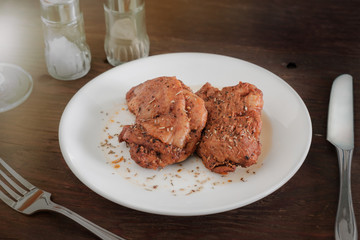 Grilled chicken / Grilled chicken on white plate.