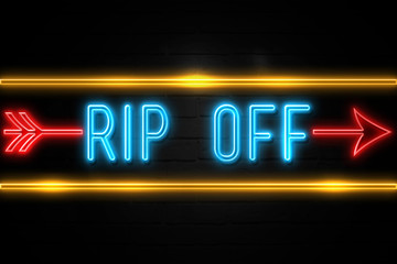Obraz premium Rip Off - fluorescent Neon Sign on brickwall Front view
