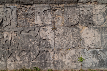 Reliefs of the players at the great ball game court at the archeological site Chichen Itza, Mexico.