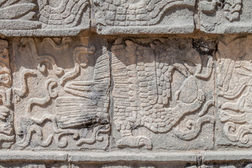 Carvings at the Platform of the Eagles and Jaguars at the archeological site Chichen Itza, Mexico