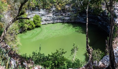 Sacred cenote at the archeological site Chichen Itza, Mexico