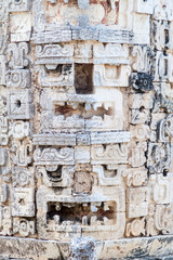 Detailed stone carvings at the Nun's Quadrangle (Cuadrangulo de las Monjas) building complex at the ruins of the ancient Mayan city Uxmal, Mexico