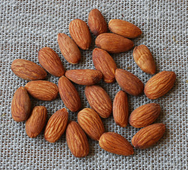 Salted almond nuts closeup