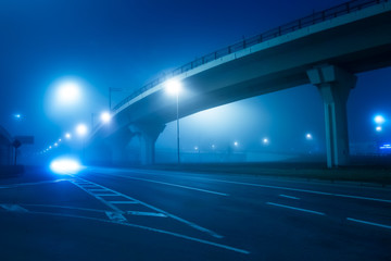 Night road in the fog. Highway. Dense fog.